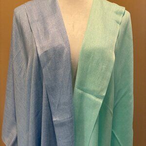 Two natural fiber pastel shawls